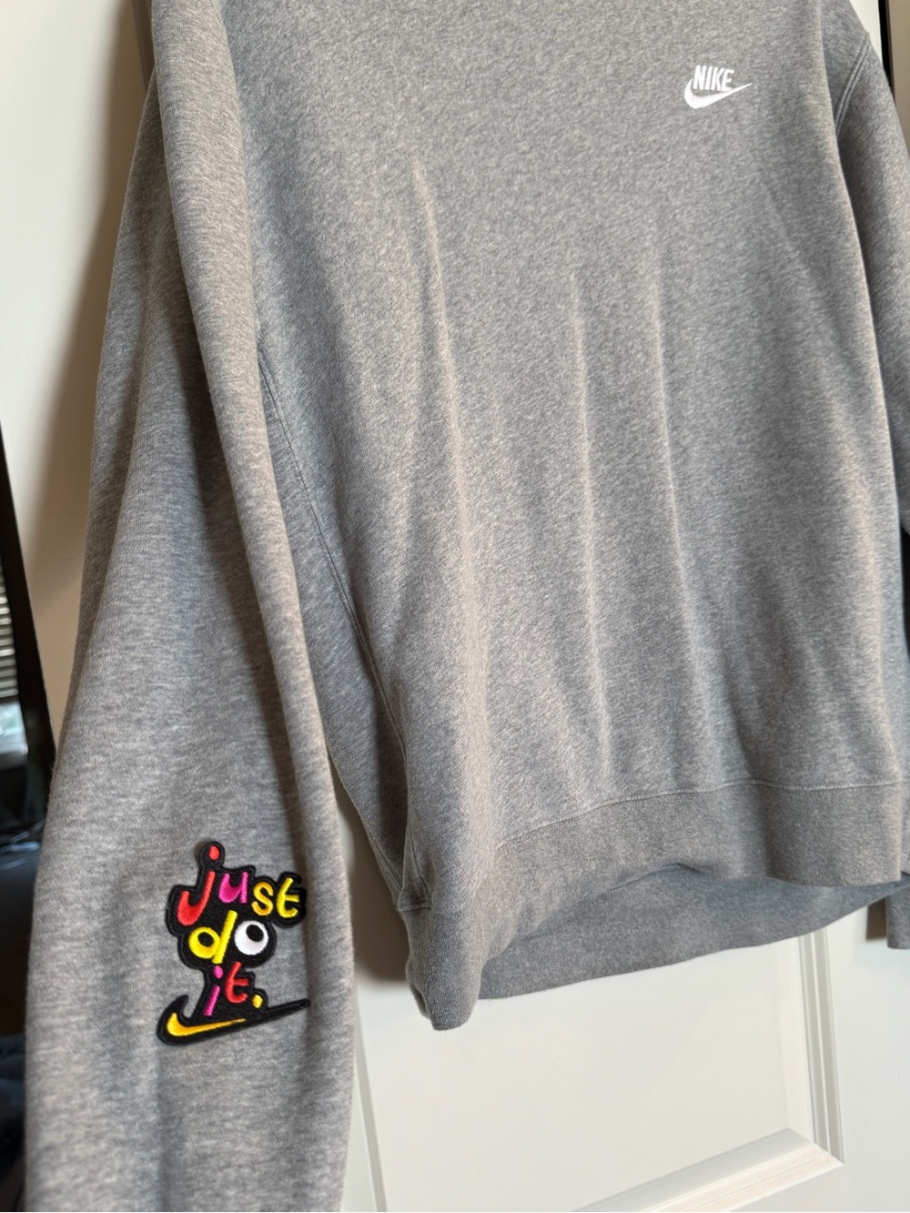 Nike Grey Crewneck Sweatshirt with Colorful 'Just Do It' Sleeve Patch
